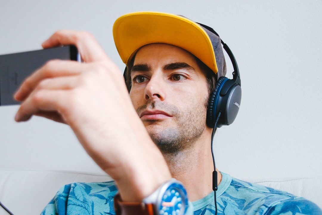 fan listening to music on headphones