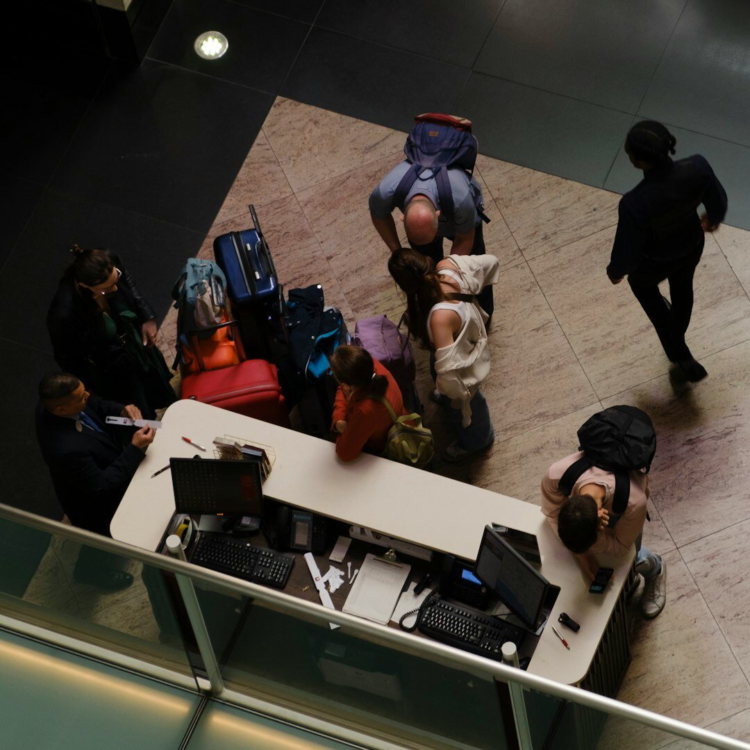Diverse team of journalists working together in a modern newsroom